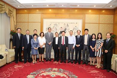 Cathy Yan (third from left), PPG Industries general manager, corporate and government affairs, Asia Pacific, stands with other leaders and experts at the release ceremony for the first China CSR Evaluation Criteria.
