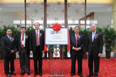 PPG Industries (NYSE:PPG) officials Stephen Lampe (second from left), vice president, purchasing and logistics; Viktoras Sekmakas (center), executive vice president; and Charles F. Kahle II (far right), chief technology officer and vice president, coatings research and development, celebrate the completion of Henan Billions' new manufacturing and research facility in the Henan Province of China with Deputy Chairman of the Board Tan Ruiqing (far left) and Chairman of the Board Xu Gang (second from right) of Henan Billions.